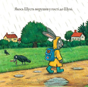Ілюстрована сторінка дитячої книжки з зайчиком у дощовику та воронами — дитячі книжки українською | BookCafe